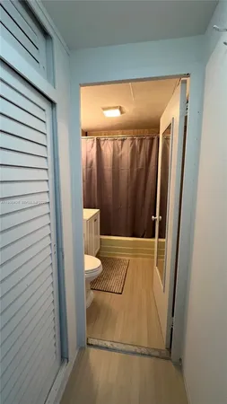 a bathroom with a sink and a shower