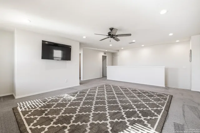 a very nice looking room with a flat screen tv