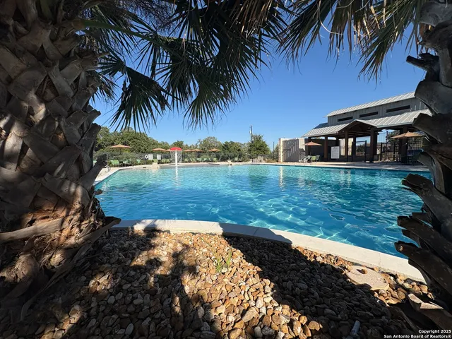 a view of a yard with a patio