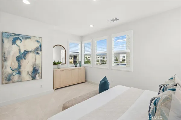 a large white room with a large window