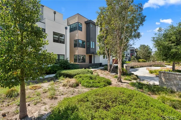 a view of a street with a building in the background