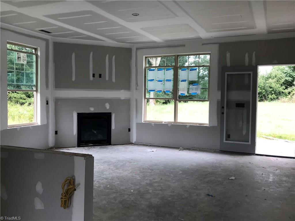 2540 Lacy Holt Road Graham, NC 27253 - Photo 5 of 12 corner fireplace