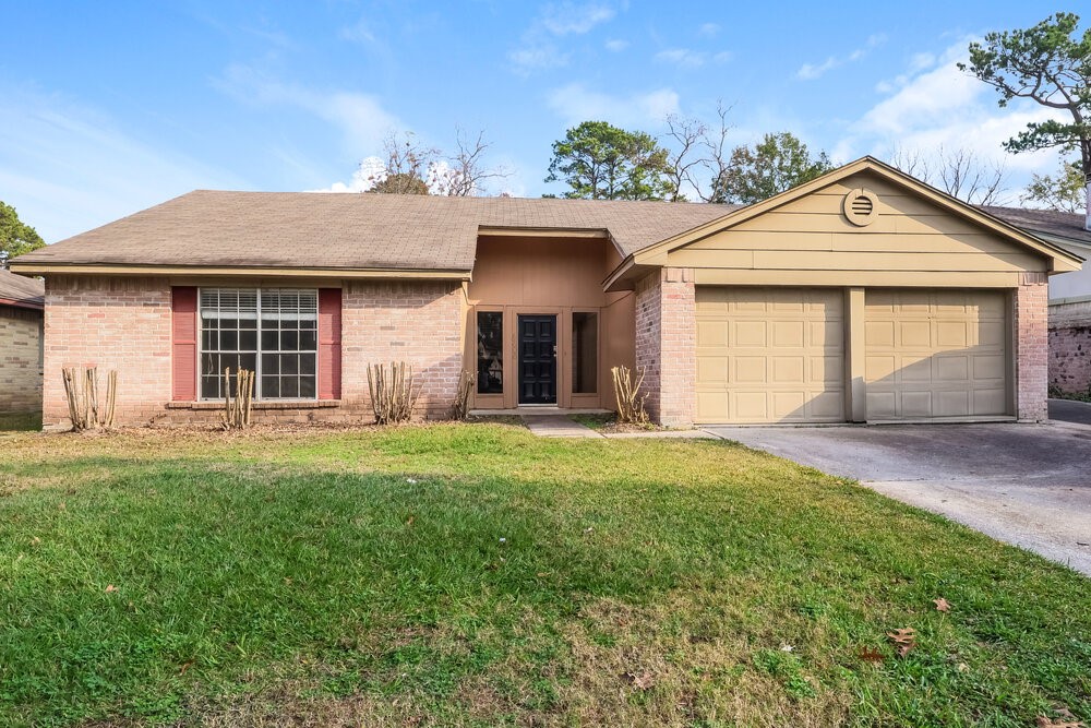 4606 Lost Lake Lane Spring, TX 77388 - Photo 1 of 16 front view of a house with a yard