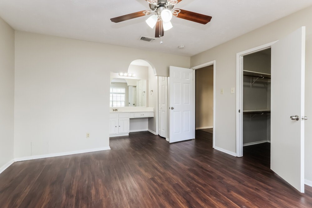 4606 Lost Lake Lane Spring, TX 77388 - Photo 9 of 16 wooden floor in an empty room with a window
