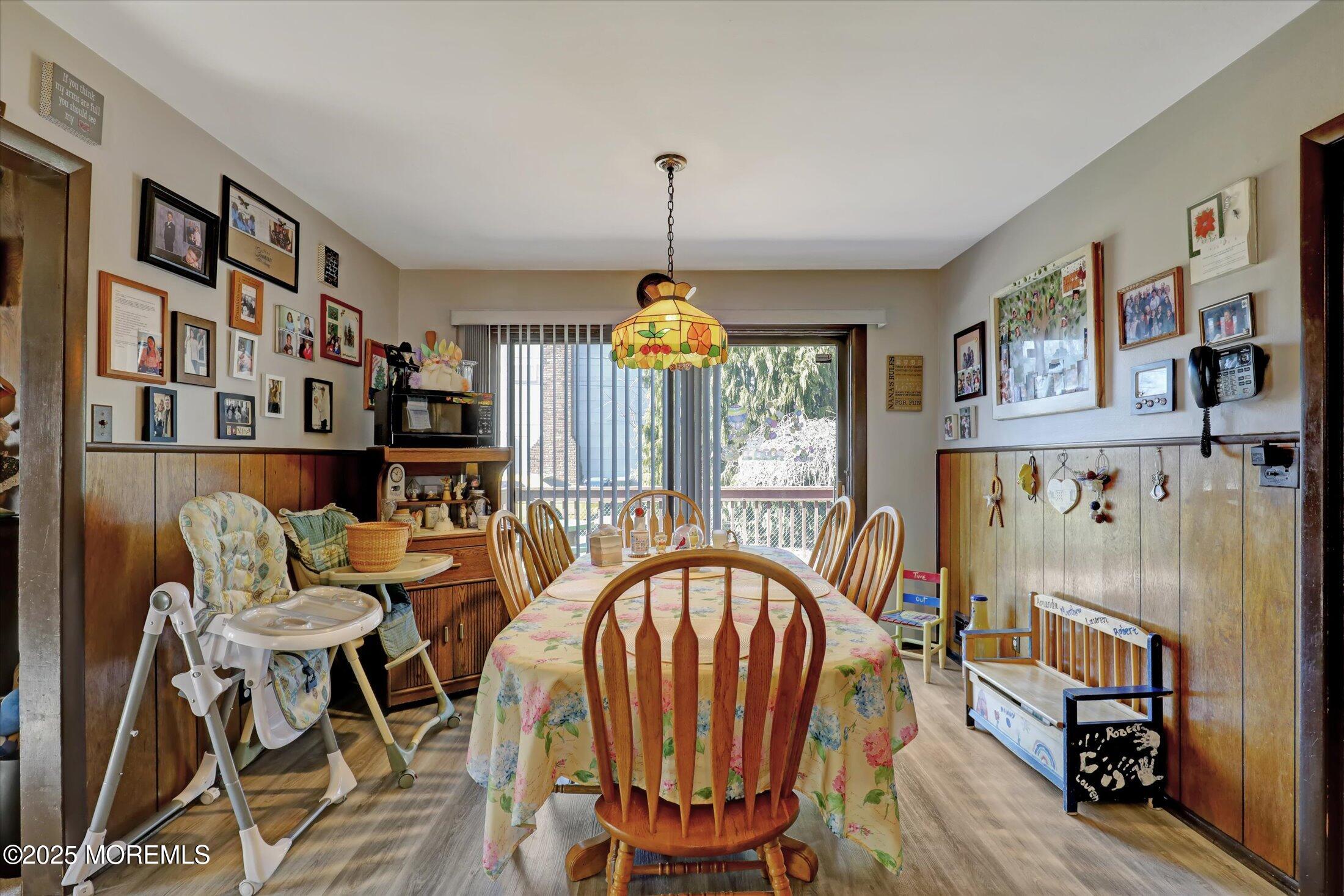 1 Peach Tree Road Oakhurst, NJ 07755 - Photo 22 of 42 a dining room with furniture window and wooden floor