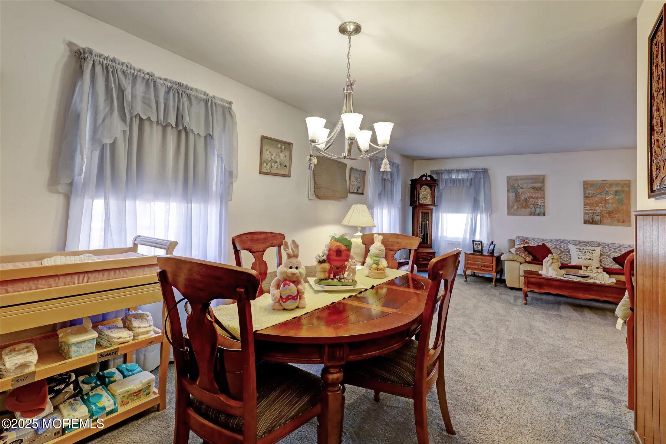 1 Peach Tree Road Oakhurst, NJ 07755 - Photo 24 of 42 a view of a dining room with furniture and window