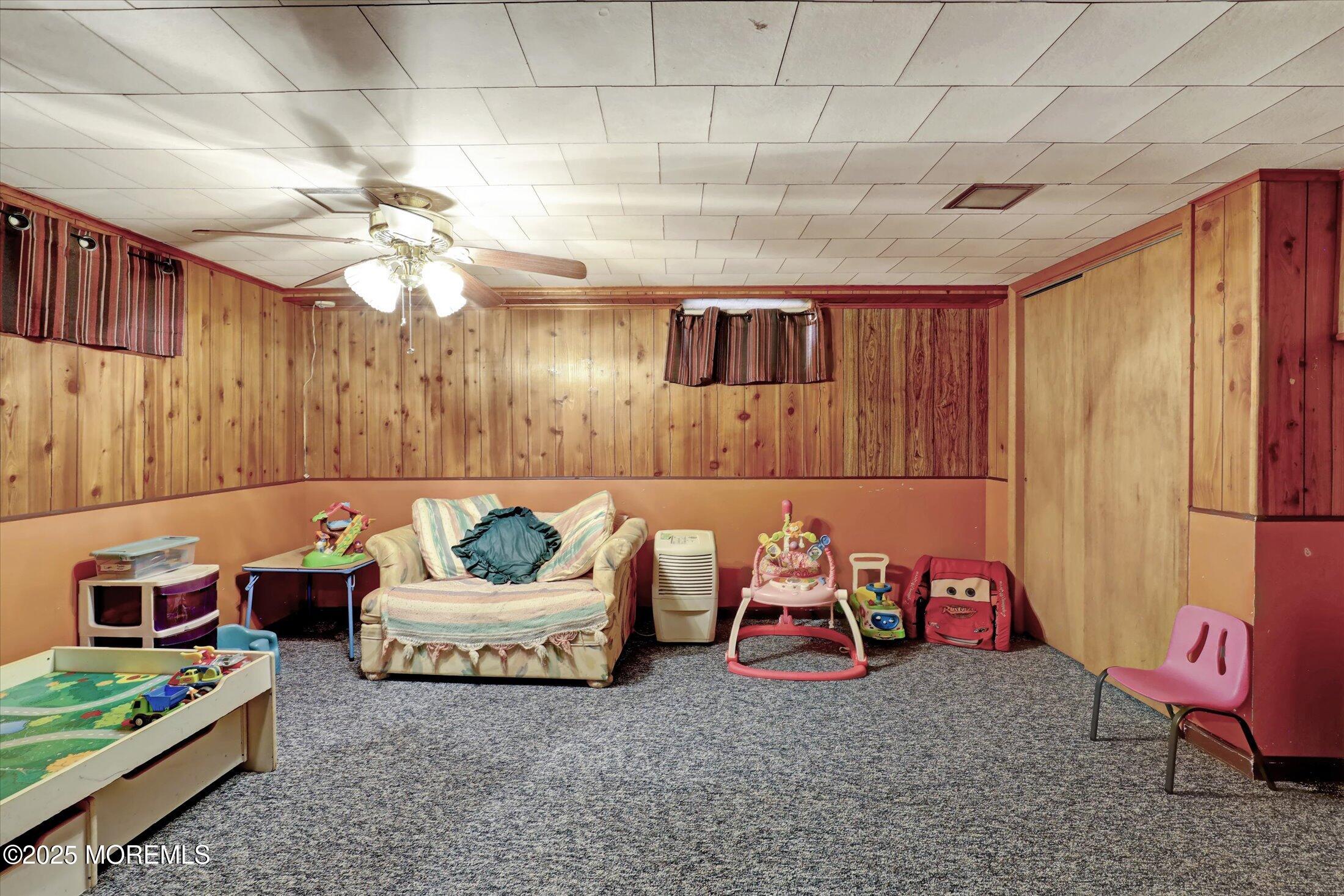 1 Peach Tree Road Oakhurst, NJ 07755 - Photo 35 of 42 a bedroom with furniture and a couch