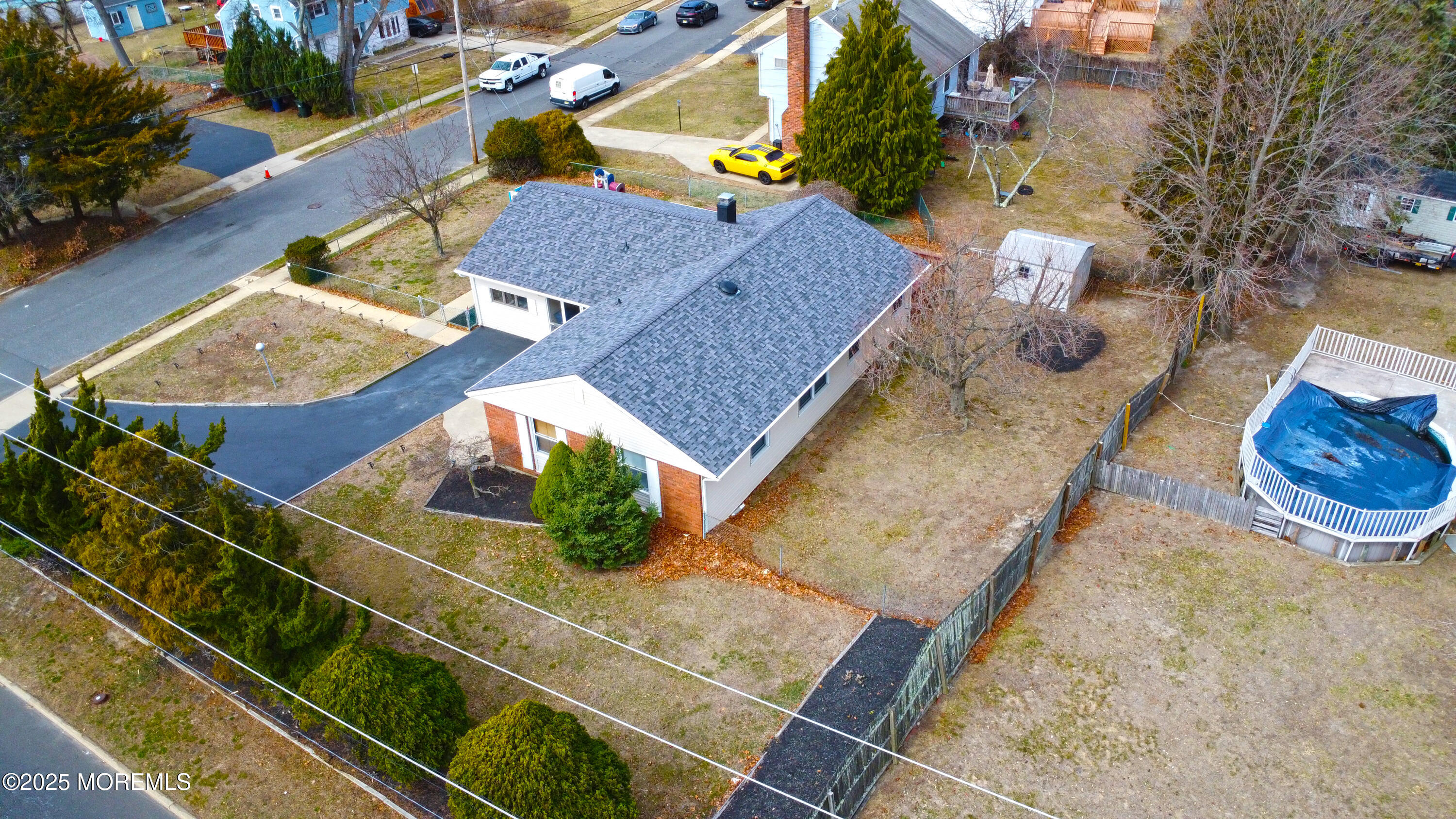 1 Peach Tree Road Oakhurst, NJ 07755 - Photo 37 of 42 an aerial view of residential houses with outdoor space