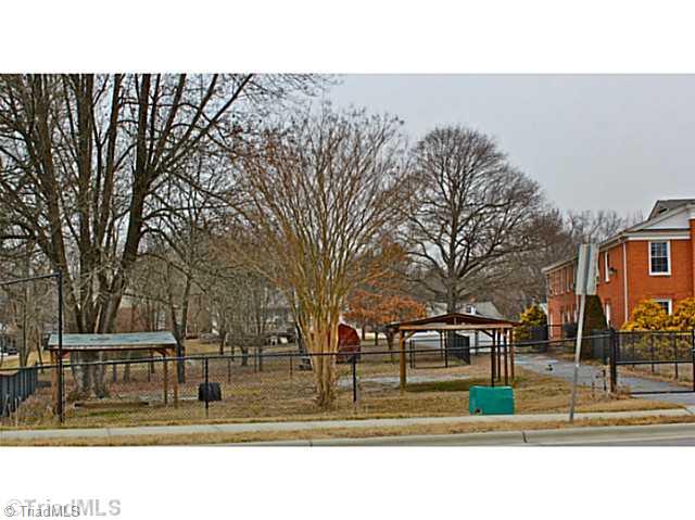 321 Oakview Road High Point, NC 27265 - Photo 2 of 16 Exterior Front. Newly fenced in playground area