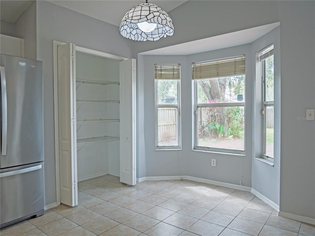 4768 Ridgemoor Circle Palm Harbor, FL 34685 - Photo 17 of 41 an empty room with windows and closet