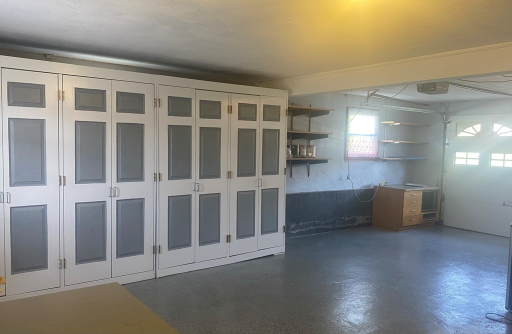 8 Sycamore Lane Saugus, MA 01906 - Photo 28 of 39 a view of an empty room with wooden floor and a window
