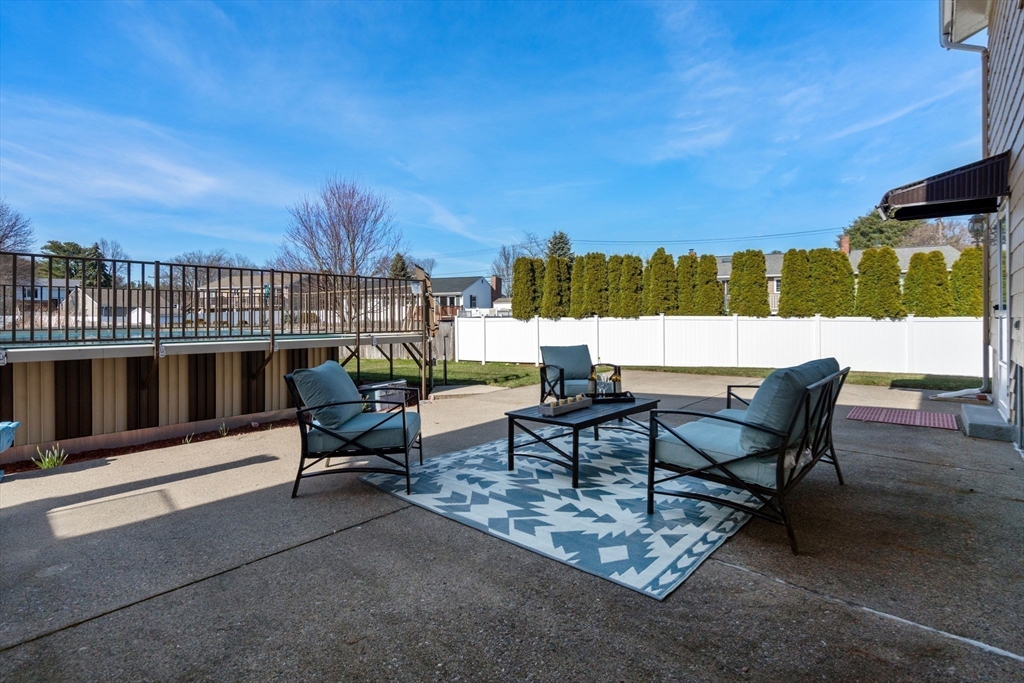 8 Sycamore Lane Saugus, MA 01906 - Photo 31 of 39 a view of a chairs and table in the terrace