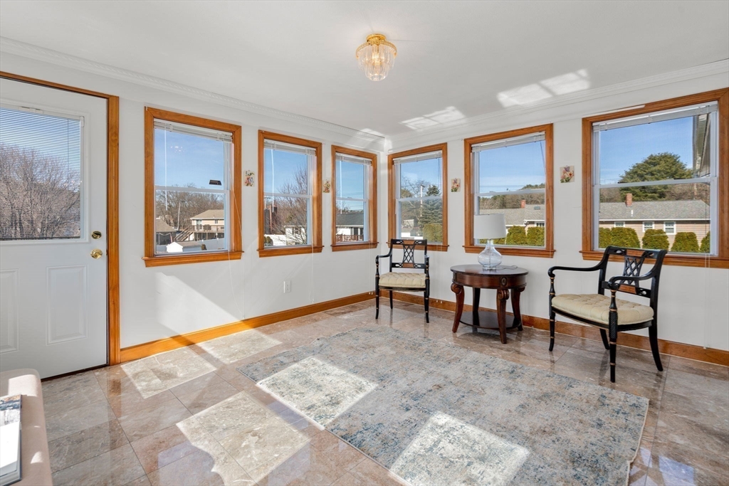 8 Sycamore Lane Saugus, MA 01906 - Photo 8 of 39 a view of a livingroom with furniture window and outside view