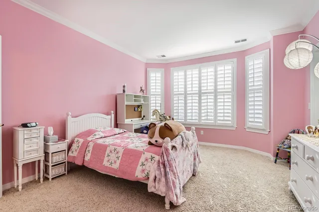 a bathroom with a sink double vanity granite tub shower and a mirror