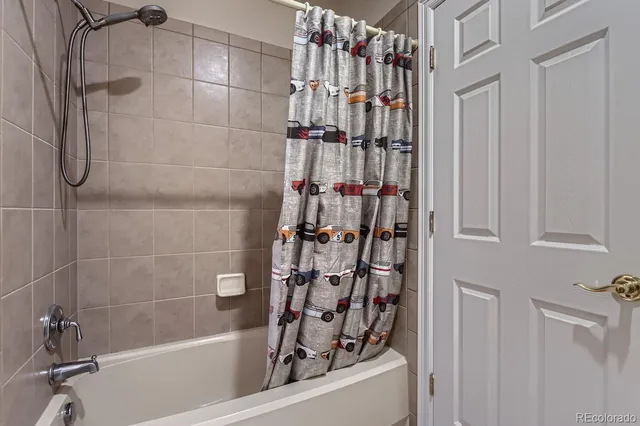 a bathroom with a sink double vanity and a mirror