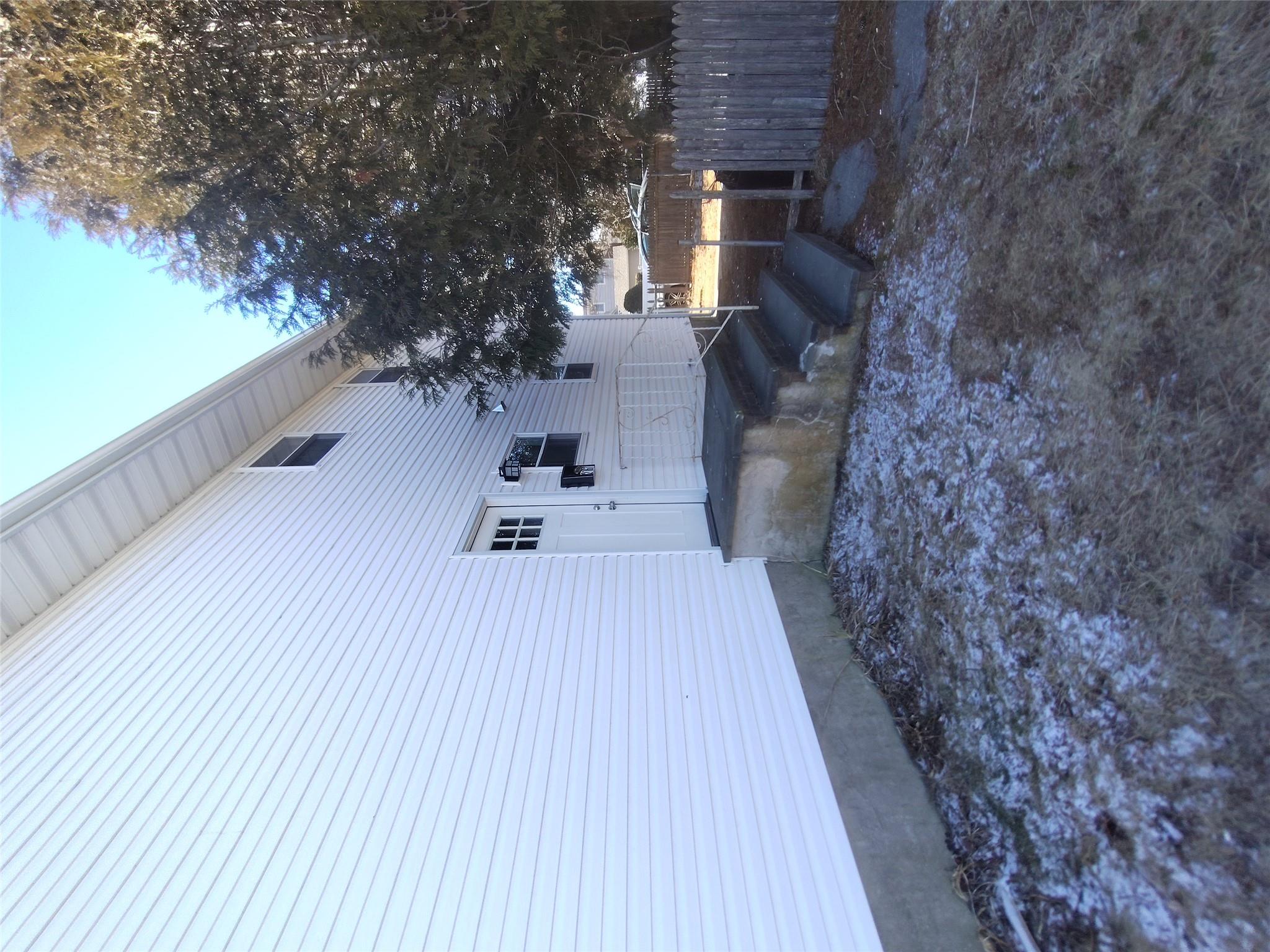 2167 A Great Neck Road Copiague, NY 11726 - Photo 3 of 18 Side door off kitchen