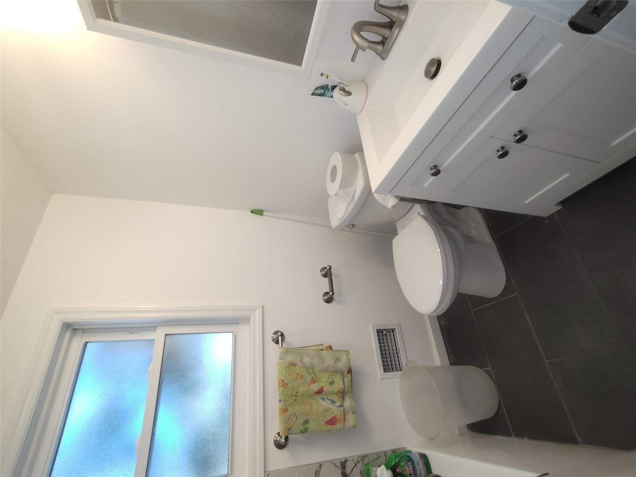 2167 A Great Neck Road Copiague, NY 11726 - Photo 6 of 18 Bathroom featuring tile patterned floors and vanity