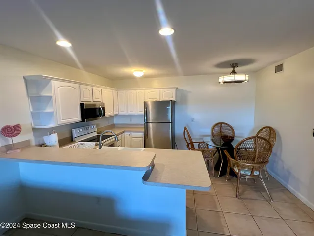 a room with furniture and a flat screen tv