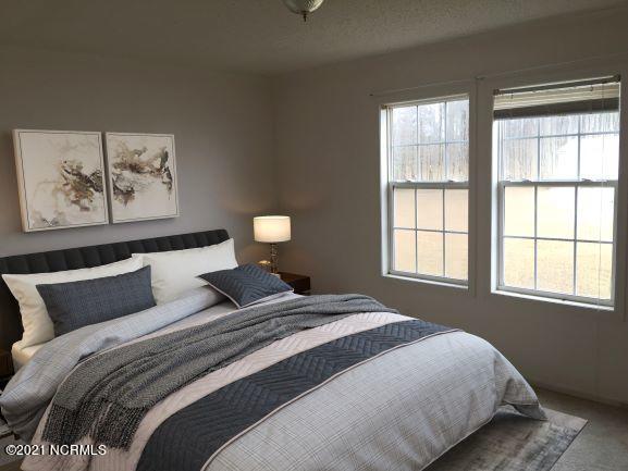 974 Jenkins Farm Road Pinetops, NC 27864 - Photo 17 of 35 E Furnished Bedroom