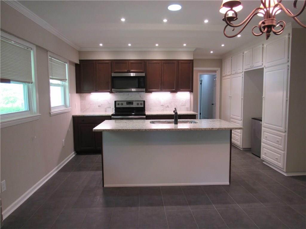 5 Old Farm Road Marietta, GA 30068 - Photo 1 of 1 THE KITCHEN YOU HAVE BEEN WAITING FOR! GRADE 3 GRANITE, MARBLE BACKSPLASH, CENTER ISLAND, PANTRY WALL FOR EXTRA STORAGE.
