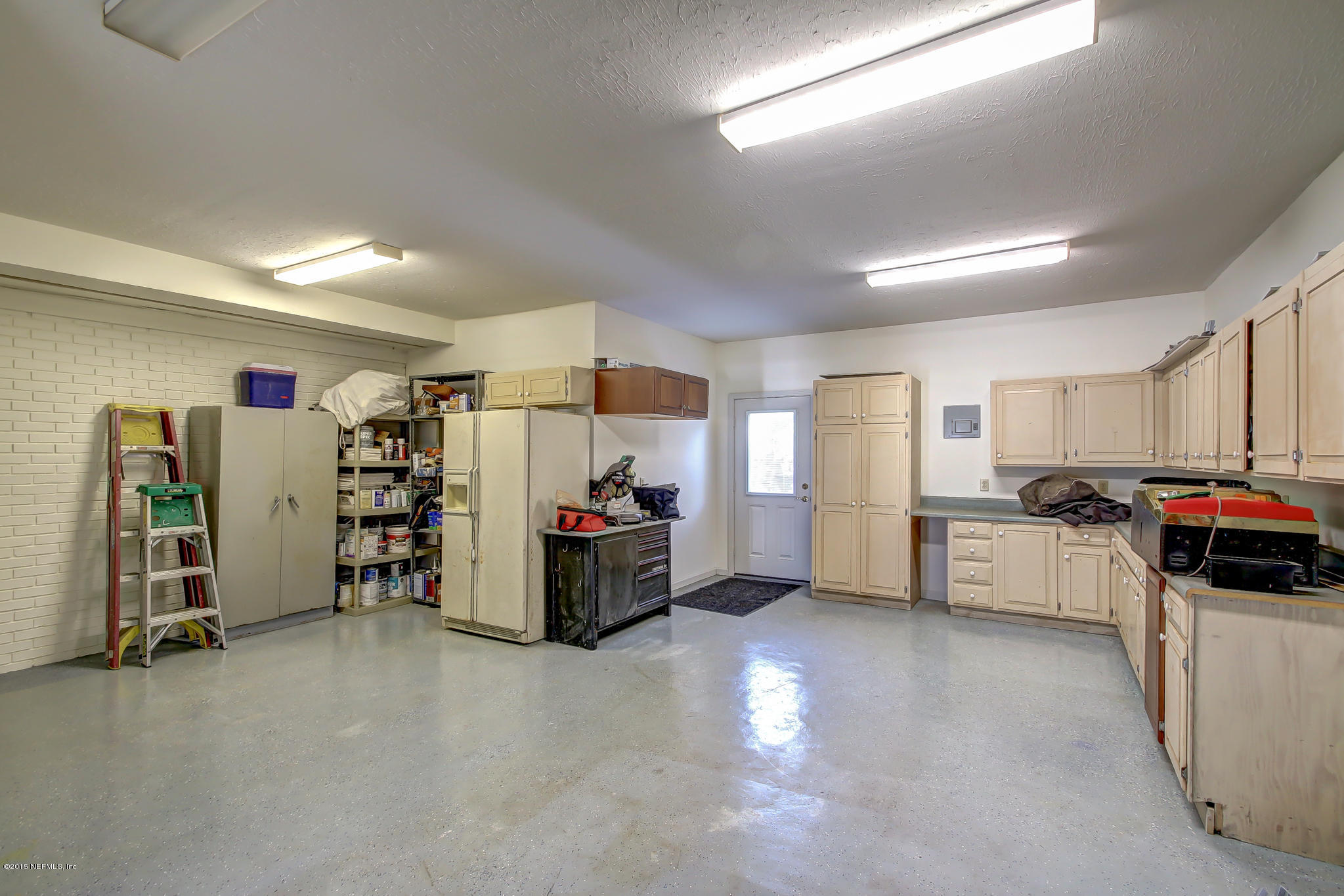 5117 Charlemagne Road Jacksonville, FL 32210 - Photo 23 of 36 Cabinets in Garage