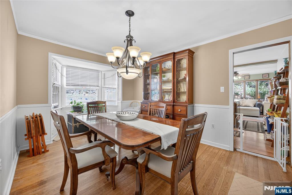 370 Goffle Road Hawthorne, NJ 07506 - Photo 14 of 37 a view of a dining room with furniture window and wooden floor