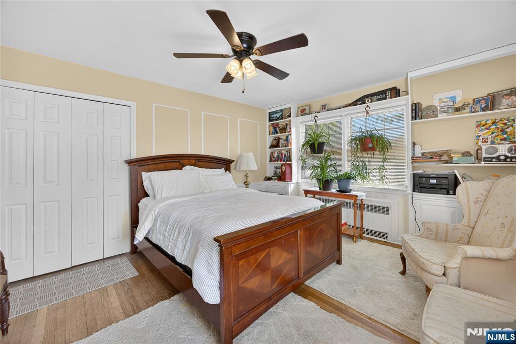 370 Goffle Road Hawthorne, NJ 07506 - Photo 16 of 37 a bed room with a bed and a window