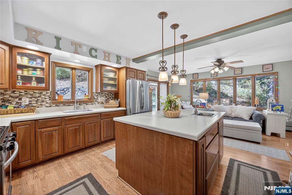 370 Goffle Road Hawthorne, NJ 07506 - Photo 2 of 37 a kitchen with sink and view of living room