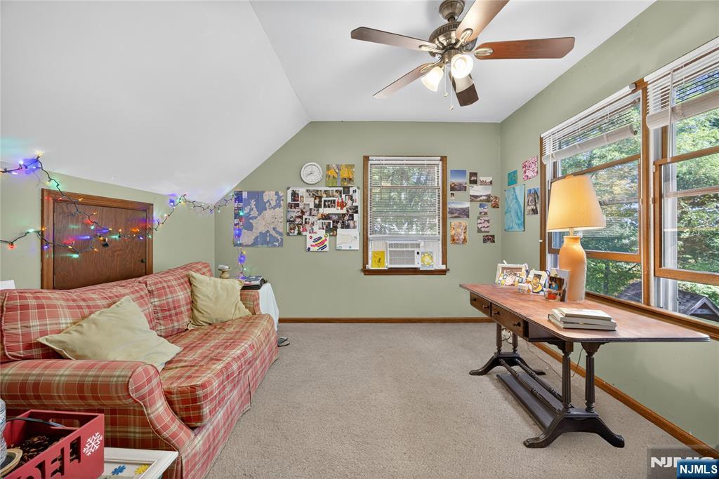 370 Goffle Road Hawthorne, NJ 07506 - Photo 21 of 37 a room with furniture and a window