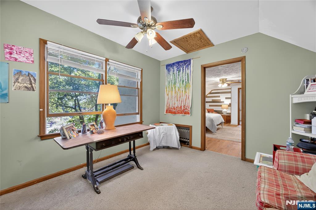 370 Goffle Road Hawthorne, NJ 07506 - Photo 22 of 37 a living room with furniture and a window