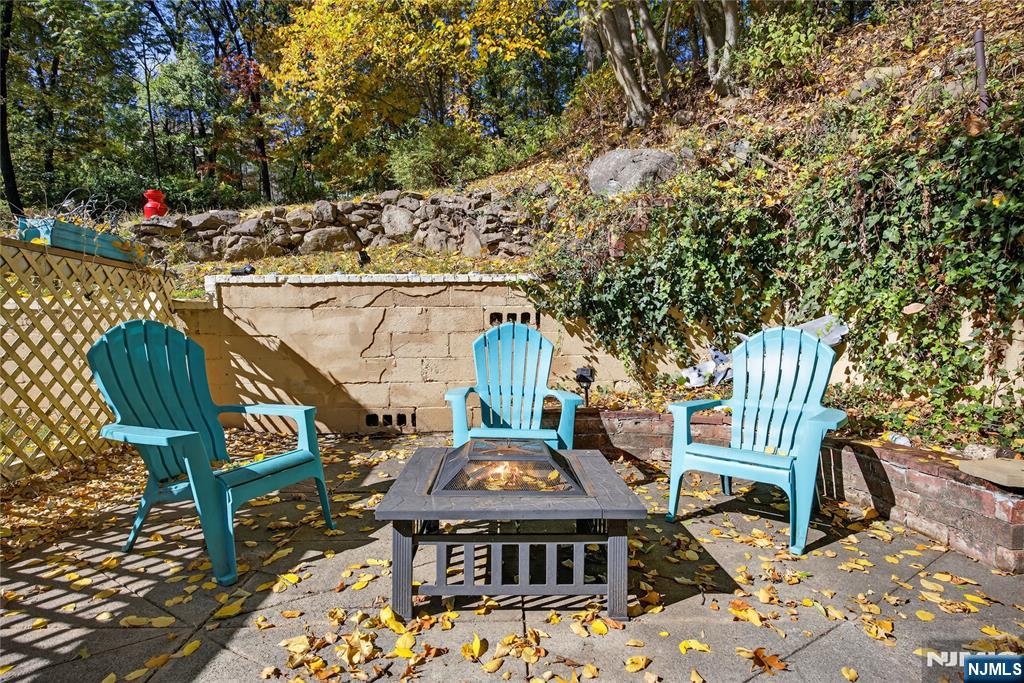 370 Goffle Road Hawthorne, NJ 07506 - Photo 33 of 37 a view of a chairs and table in the patio