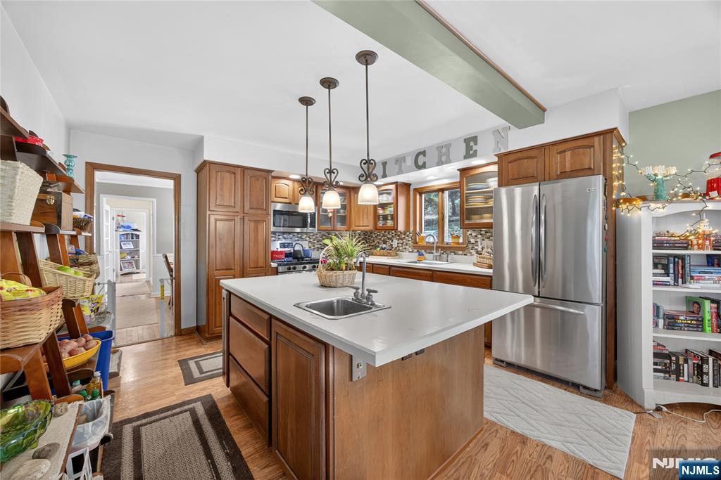 370 Goffle Road Hawthorne, NJ 07506 - Photo 8 of 37 a kitchen with stainless steel appliances granite countertop a refrigerator a oven and a sink
