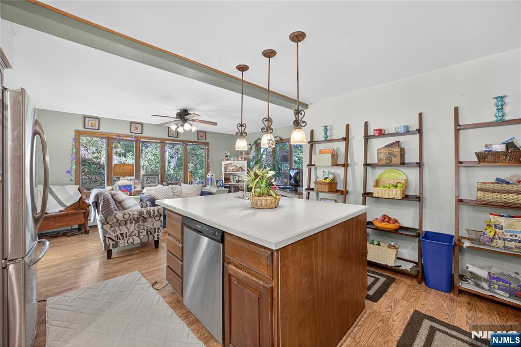 370 Goffle Road Hawthorne, NJ 07506 - Photo 10 of 37 a kitchen with a counter top space appliances and furniture