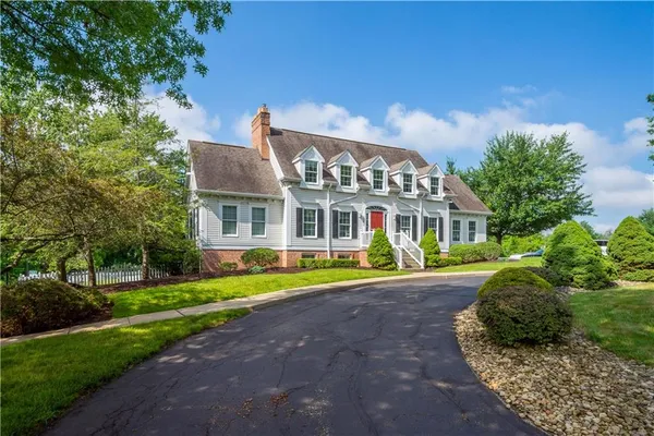 a view of a swimming pool with a lounge chairs