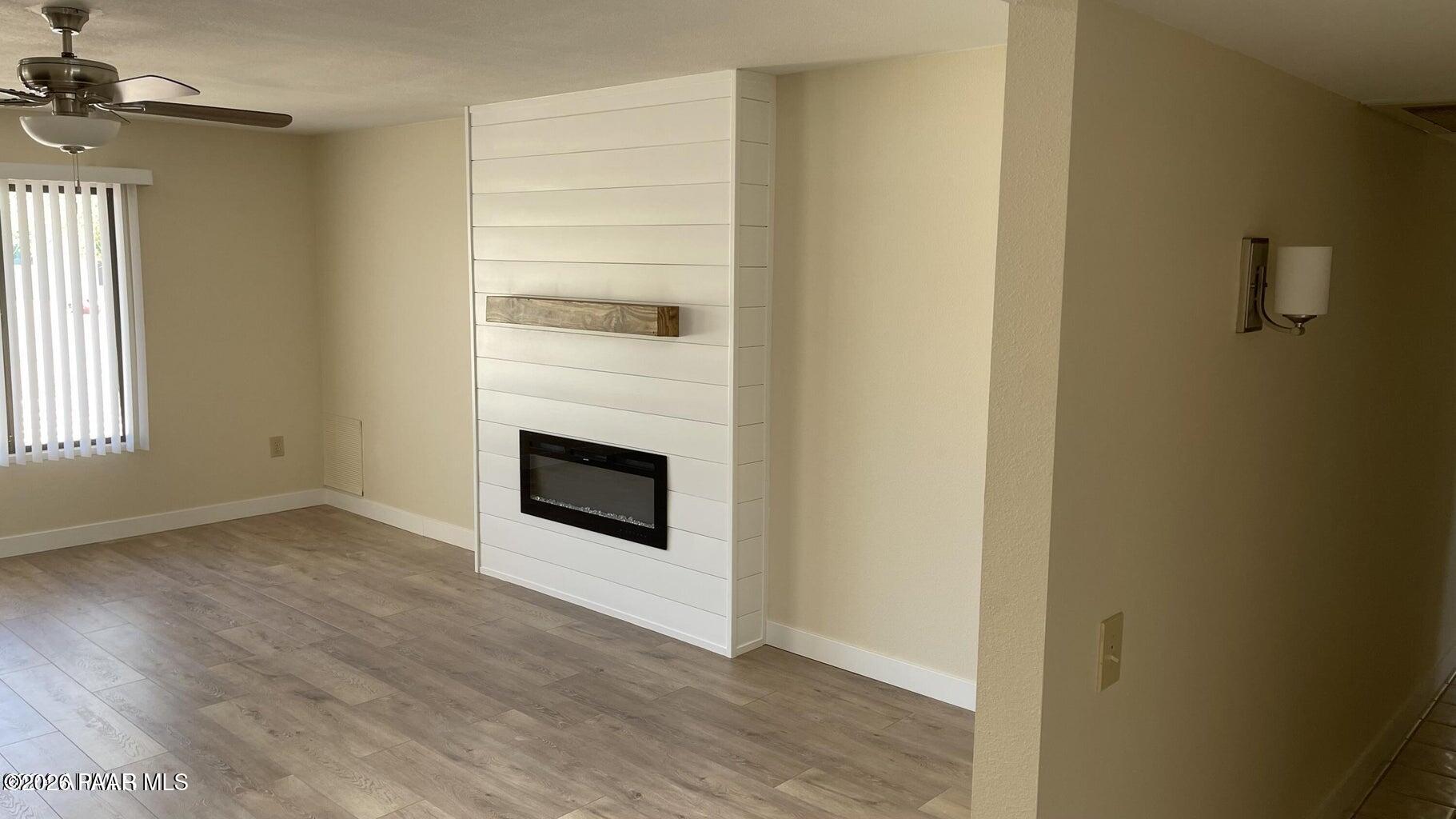 12602 West Rampart Drive Sun City, AZ 85375 - Photo 6 of 28 Fireplace