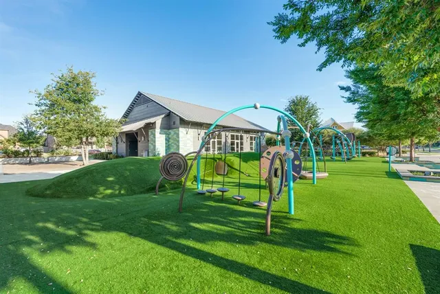 a view of a house with a park