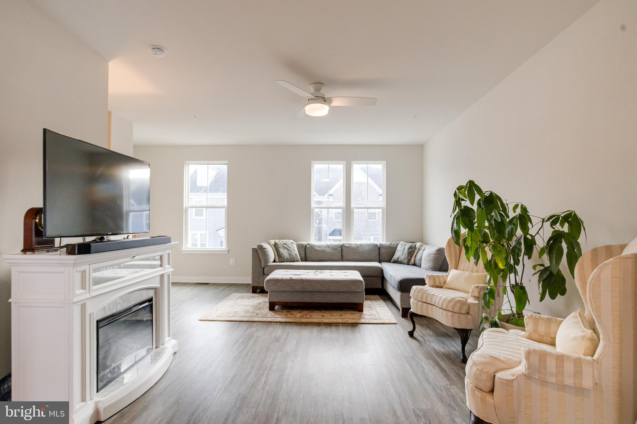 6222 Islington Street Middle River, MD 21220 - Photo 27 of 76 a living room with furniture and a flat screen tv