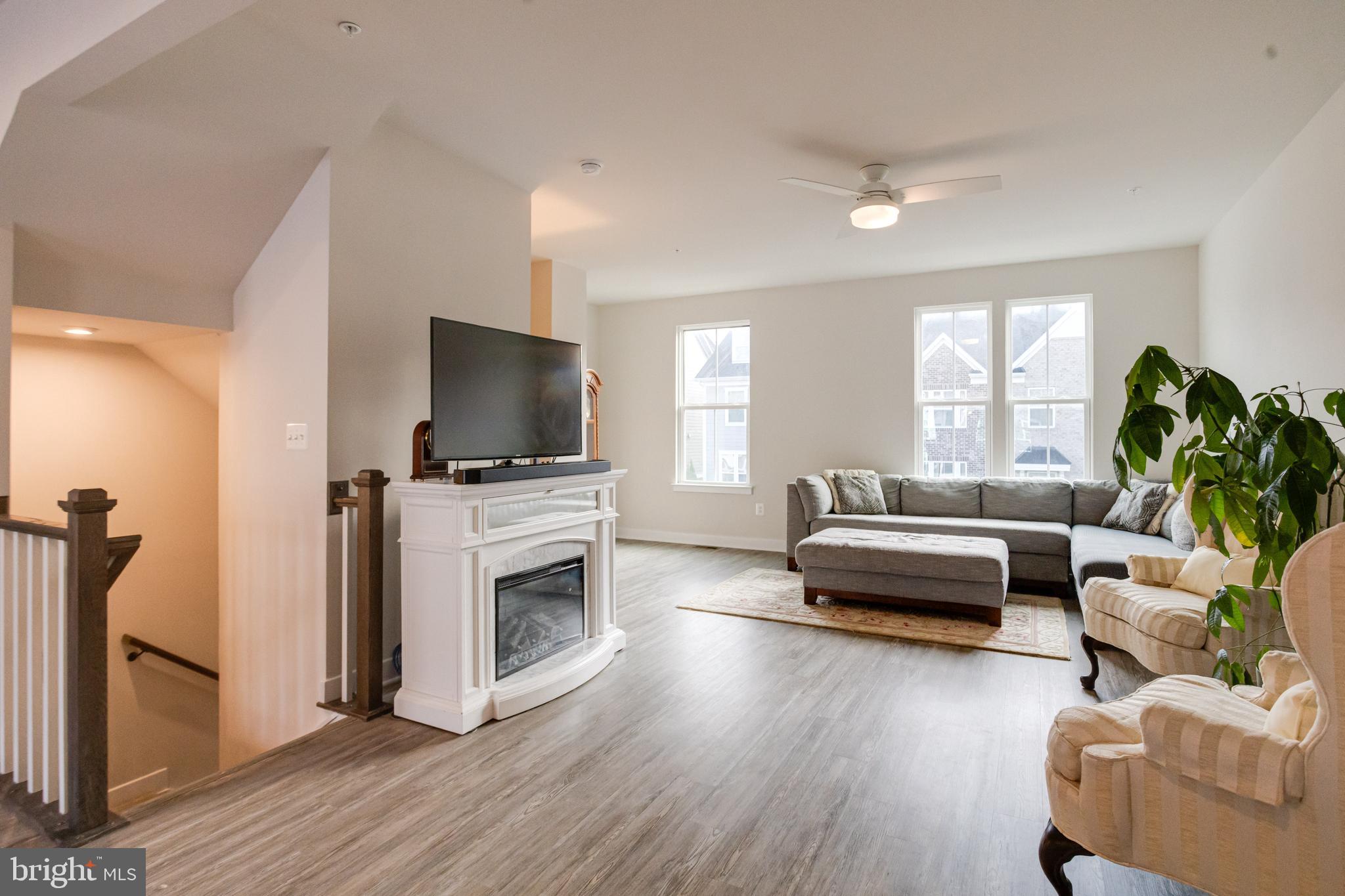 6222 Islington Street Middle River, MD 21220 - Photo 28 of 76 a living room with furniture and a flat screen tv