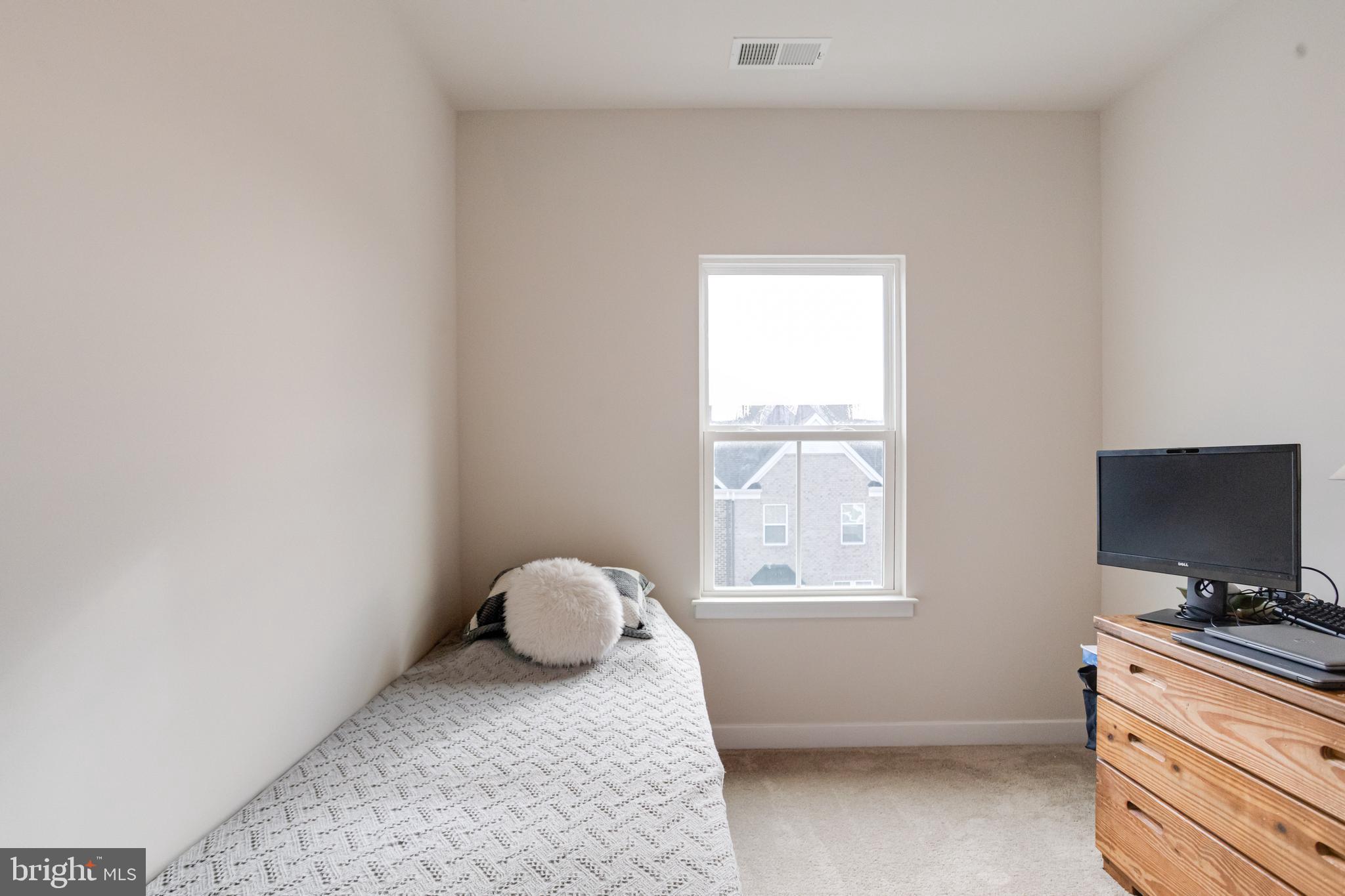 6222 Islington Street Middle River, MD 21220 - Photo 47 of 76 a bedroom with a bed and a flat screen tv