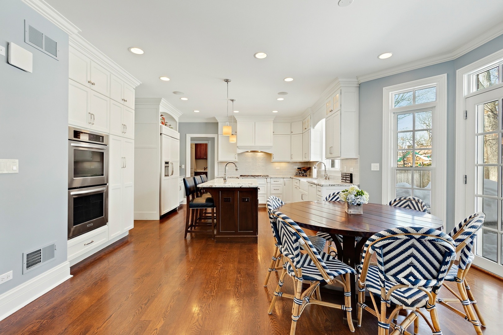1161 Chatfield Road Winnetka, IL 60093 - Photo 14 of 42 a view of a dining room with furniture and wooden floor