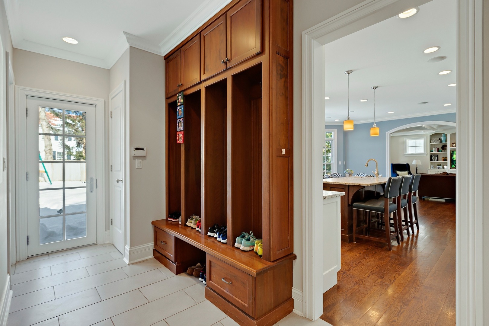 1161 Chatfield Road Winnetka, IL 60093 - Photo 18 of 42 a view of a dining room with furniture window and wooden floor
