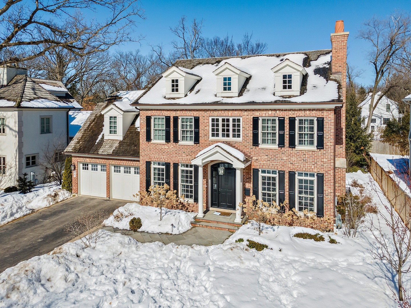 1161 Chatfield Road Winnetka, IL 60093 - Photo 3 of 42 a front view of a house with a yard