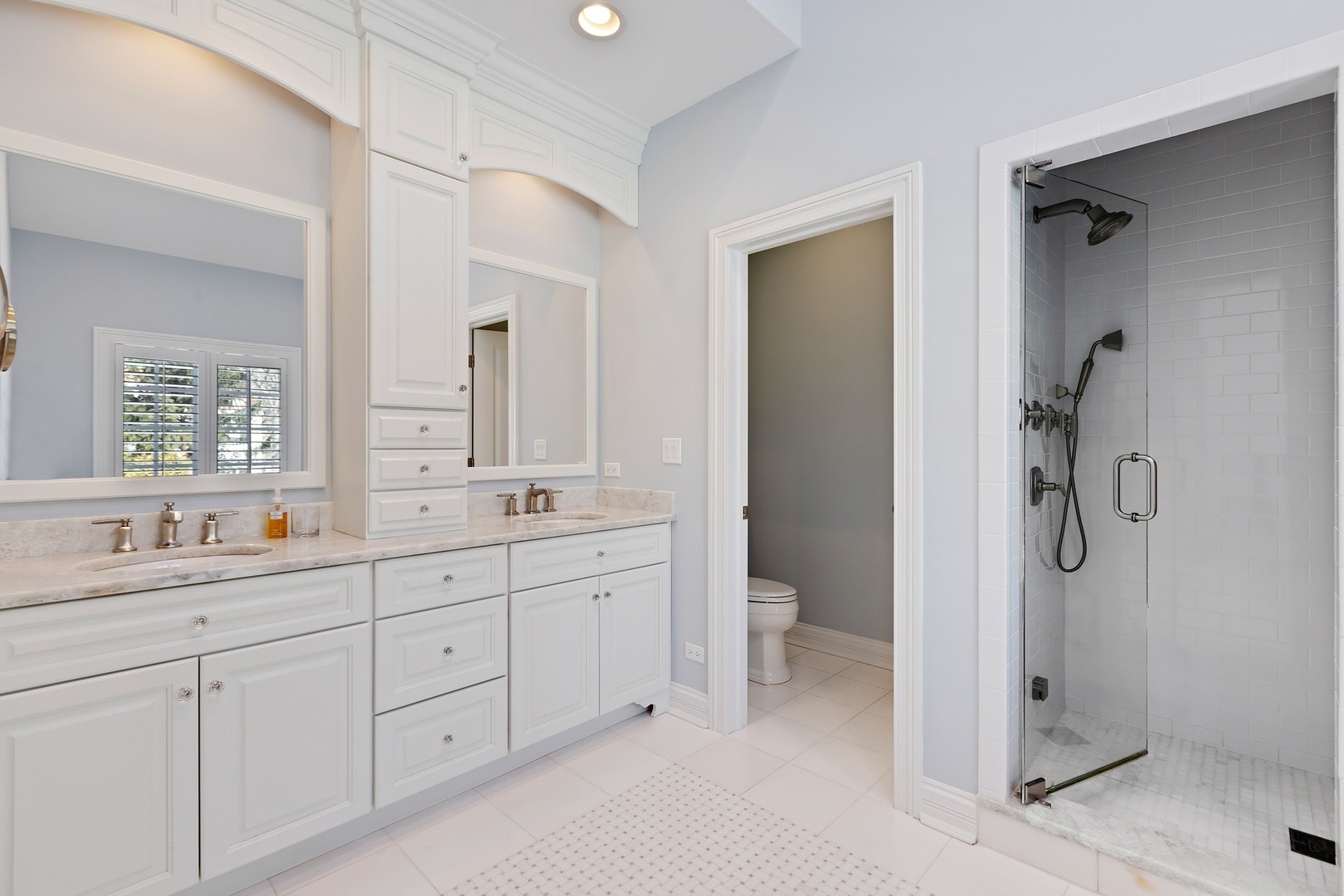 1161 Chatfield Road Winnetka, IL 60093 - Photo 23 of 42 a spacious bathroom with double sink and a mirror