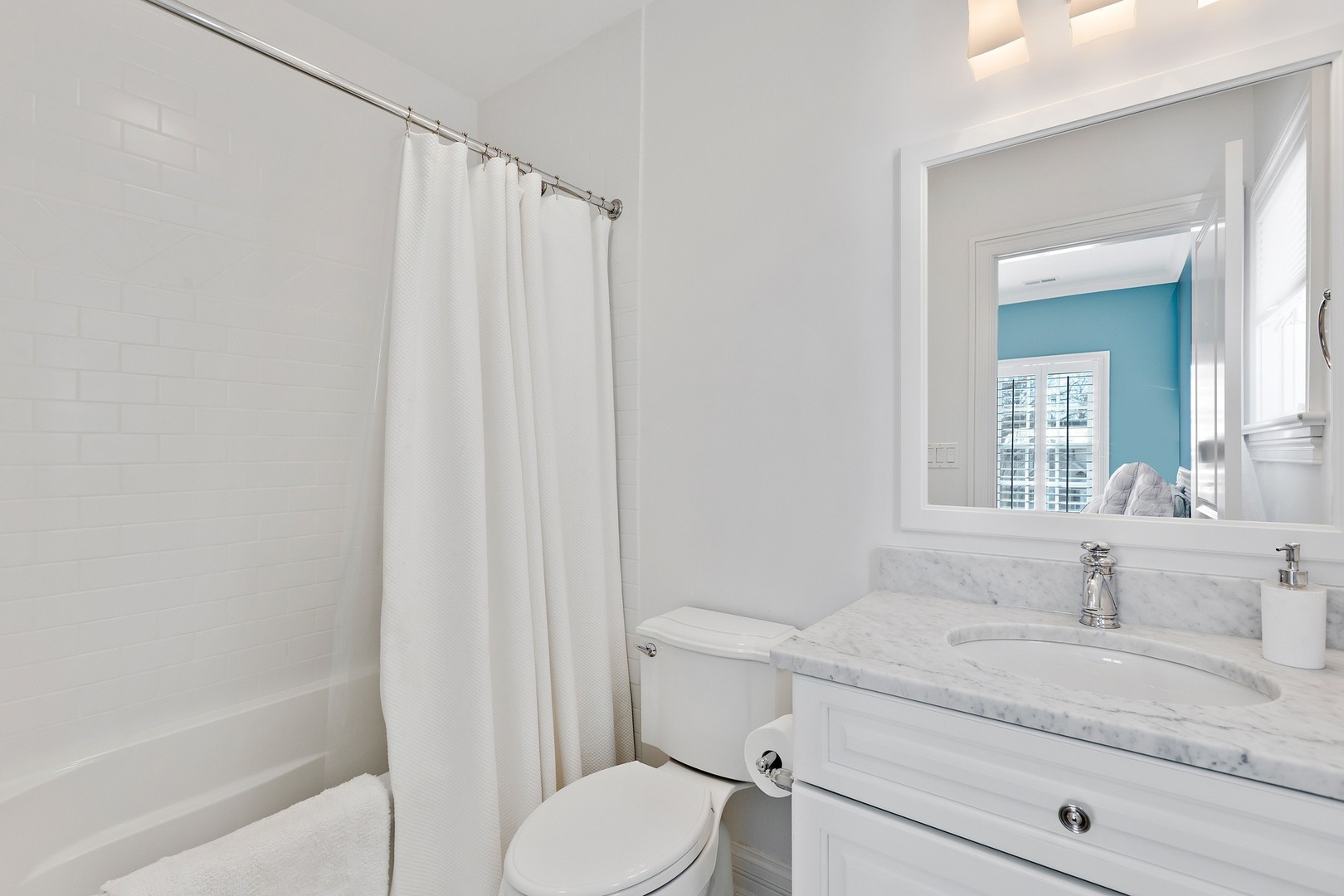 1161 Chatfield Road Winnetka, IL 60093 - Photo 26 of 42 a bathroom with a granite countertop sink toilet and shower