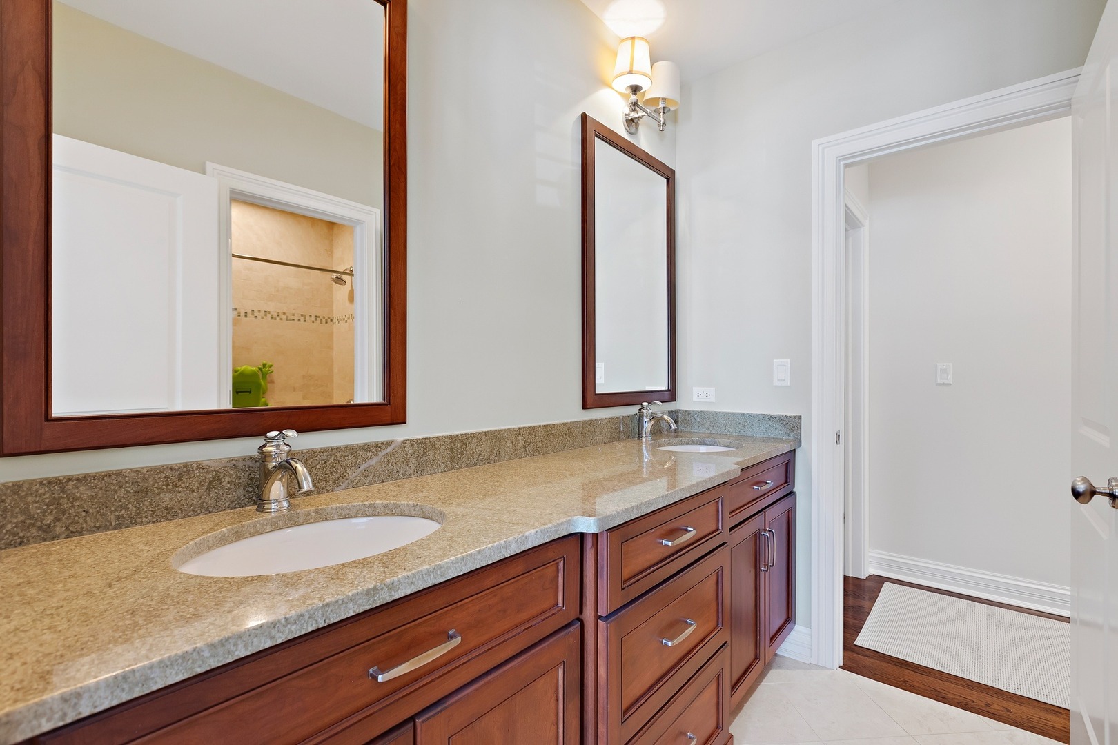 1161 Chatfield Road Winnetka, IL 60093 - Photo 28 of 42 a bathroom with a granite countertop sink and a mirror