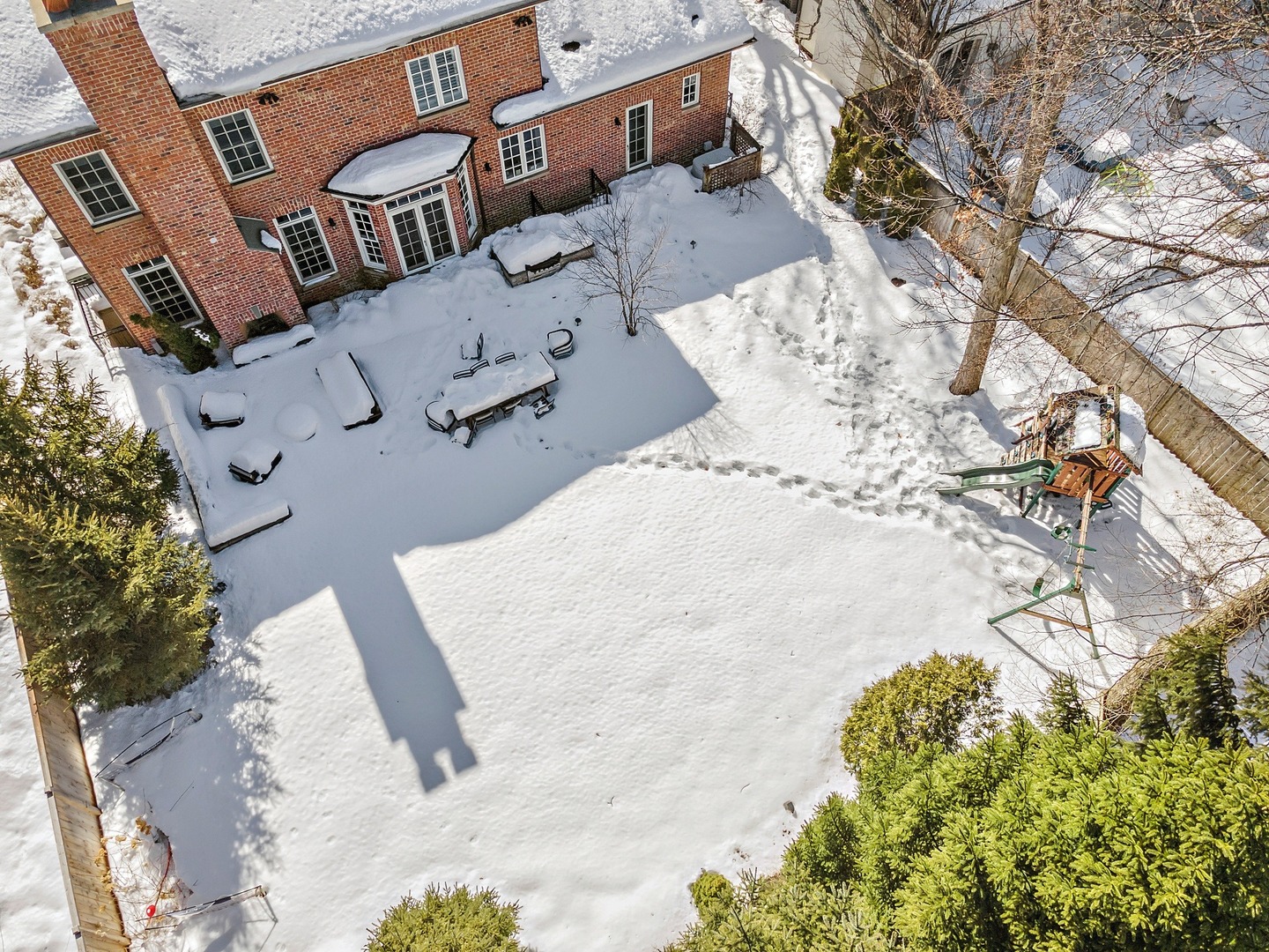 1161 Chatfield Road Winnetka, IL 60093 - Photo 42 of 42 an aerial view of a house with a yard and sitting area