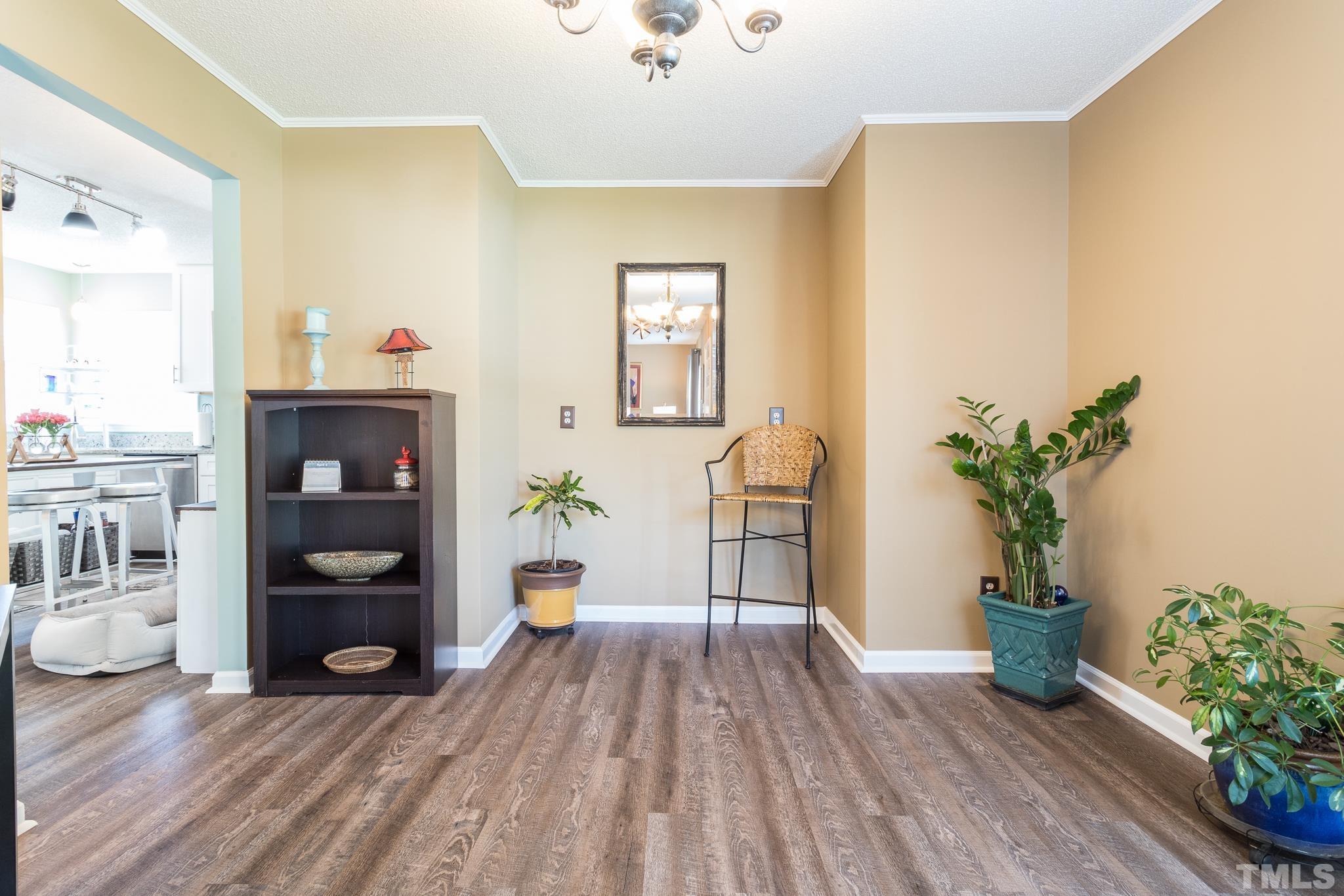 2352 Declaration Drive Raleigh, NC 27615 - Photo 14 of 28 a view of livingroom with furniture and wooden floor