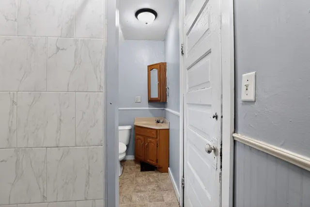 a bathroom with a sink and mirror