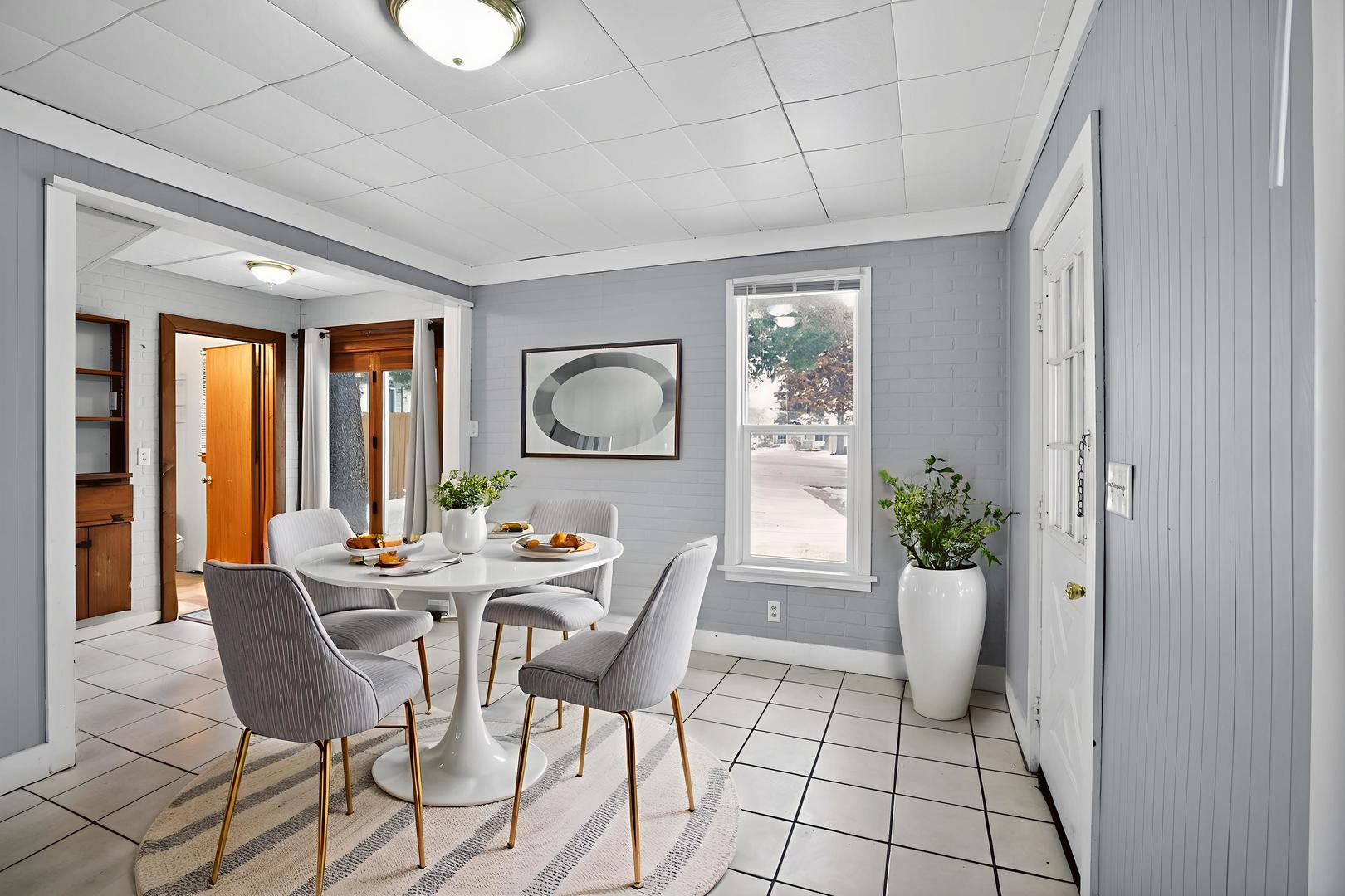 1250 West American Street Freeport, IL 61032 - Photo 6 of 23 a view of a dining room with furniture window and outside view