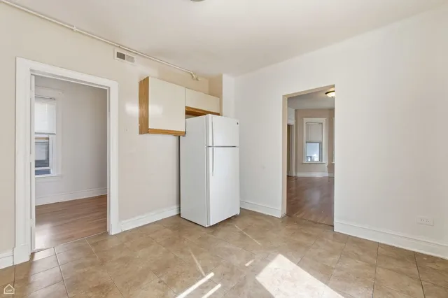 an empty room with a door